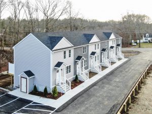 Aerial (drone) view of the front of 6 townhouses in East Bridgewater, MA.