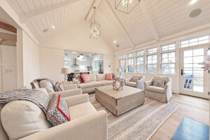 Image of the living room in a 2-story contemporary style home in Osterville, MA.