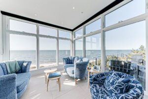 Image of the sitting area in a 2-story contemporary style home on Cape Cod, MA.