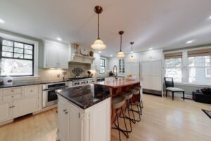 Image of the kitchen in a 2-story colonial style home in North Attleborough, MA.