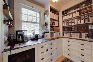 Image of the butler pantry in a 3-story colonial style home and property in North Attleborough, MA.